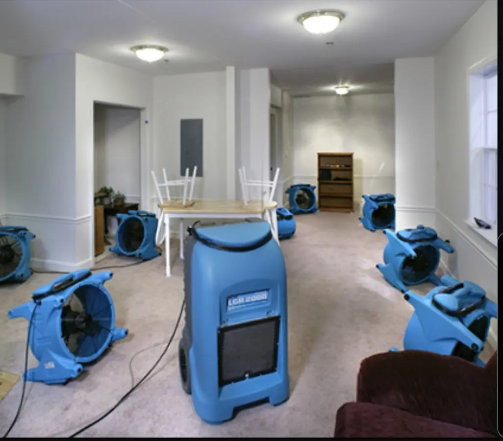 Air movers and dehumidifier setup for Water Extraction & Removal in Lacombe